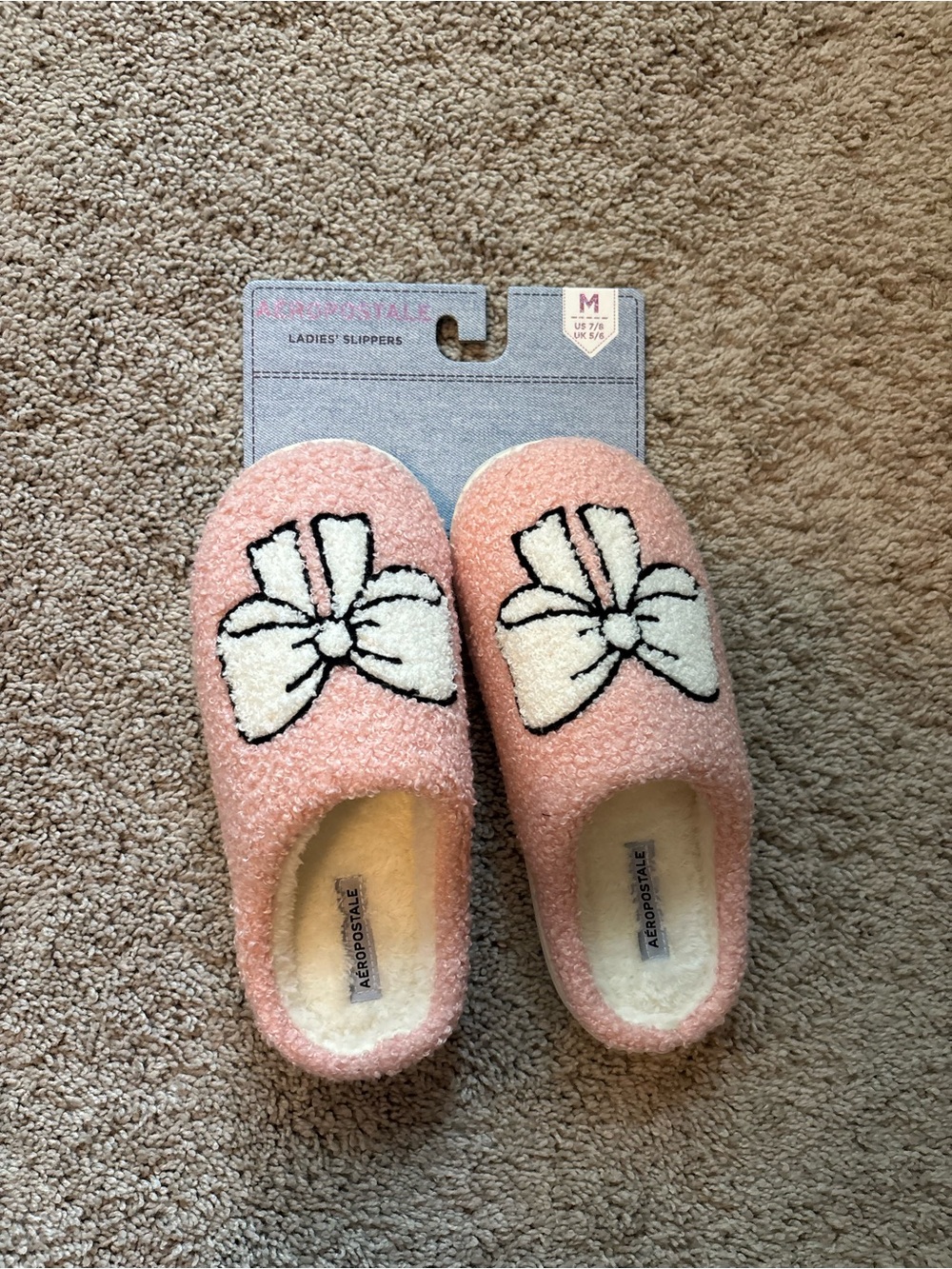 Aeropostale Pink Plush Slip-On Slippers with White Bow Accent